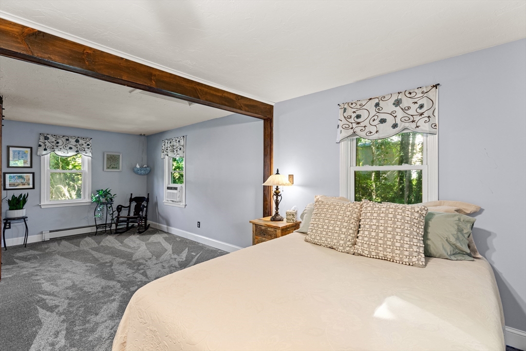 901 Head Of The Bay Road Bourne, MA 02532 - Photo 13 of 20 a bedroom with a bed and a window