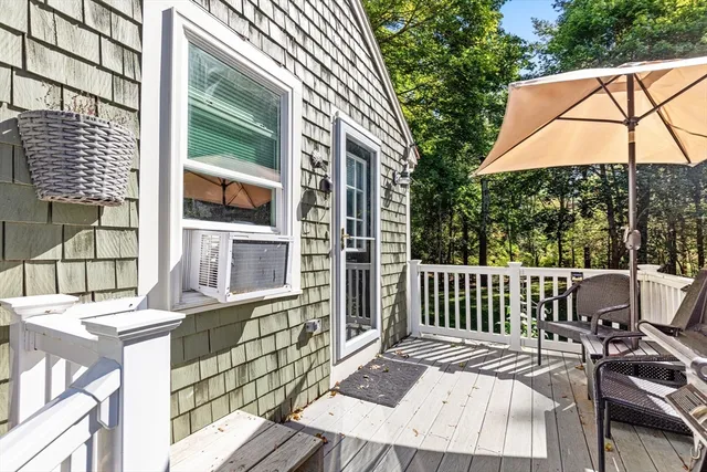a view of a patio on the deck front of house