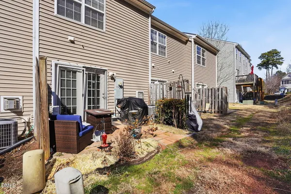a view of house with patio outdoor seating
