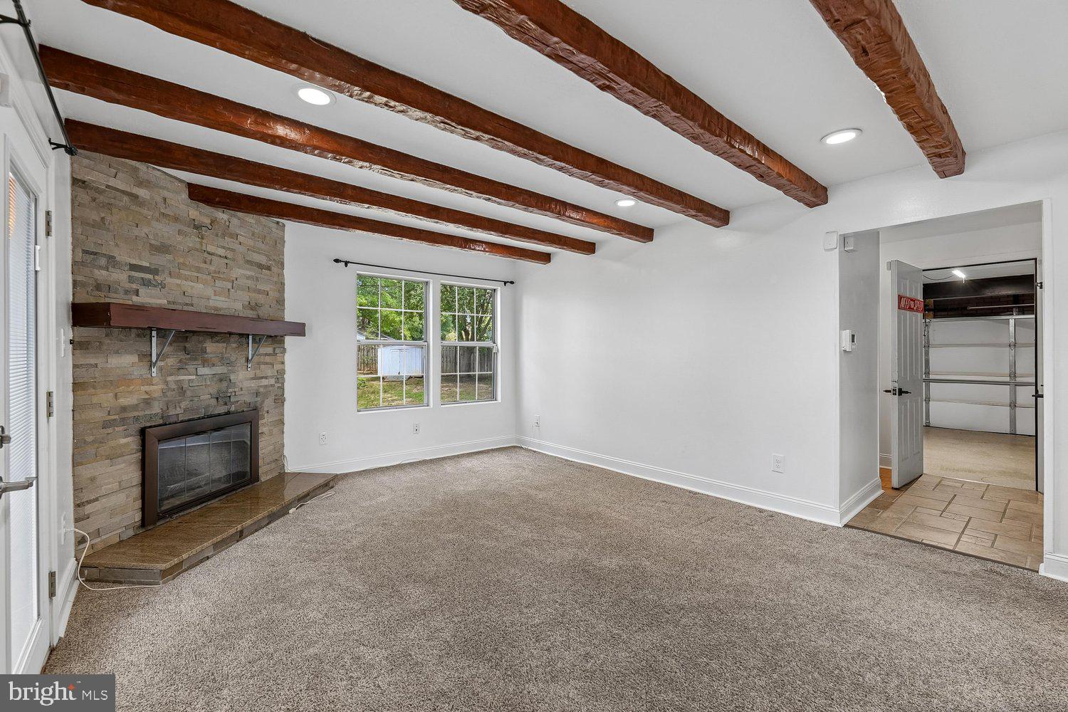 15764 Beau Ridge Drive Woodbridge, VA 22193 - Photo 15 of 58 a view of empty room with a fireplace
