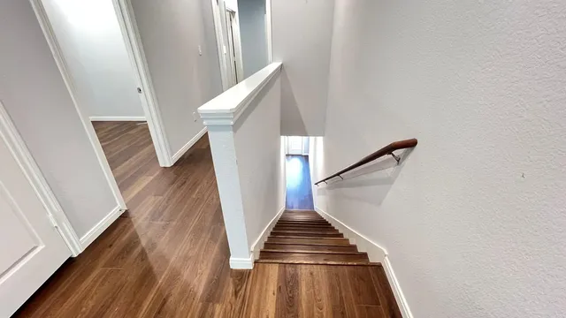 a view of entryway with wooden floor