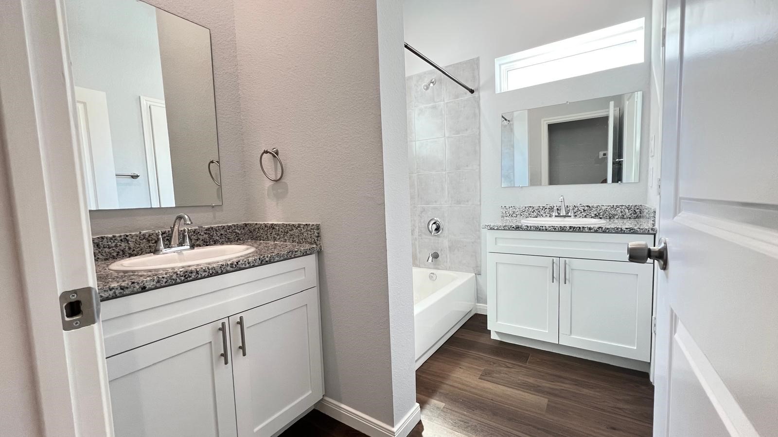 4922 Dalhart Dr Spring Spring, TX 77379 - Photo 21 of 33 a en suite bathroom with a granite countertop sink and a mirror