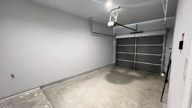 a view of an empty room with a staircase