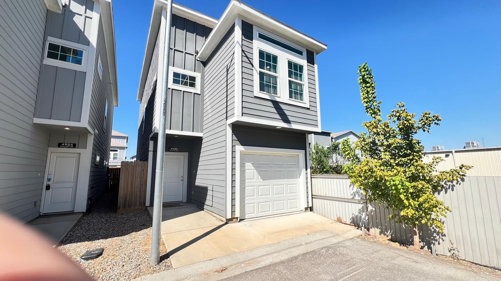 4922 Dalhart Dr Spring Spring, TX 77379 - Photo 6 of 33 a front view of a house with a garden