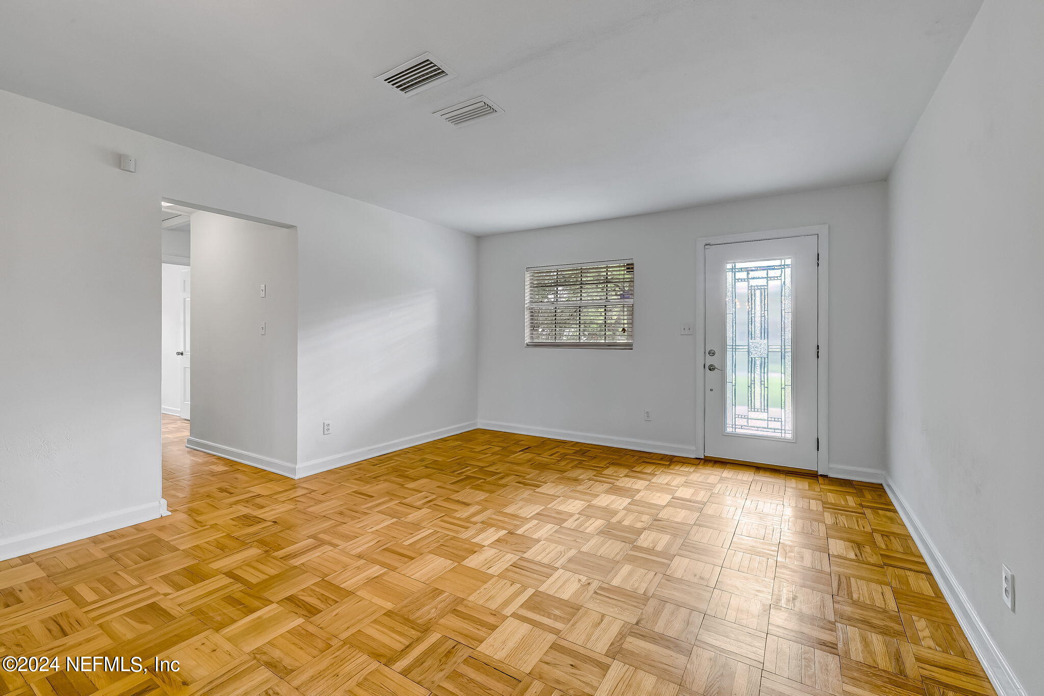 5614 Capri Road Jacksonville, FL 32244 - Photo 12 of 45 a view of empty room with window