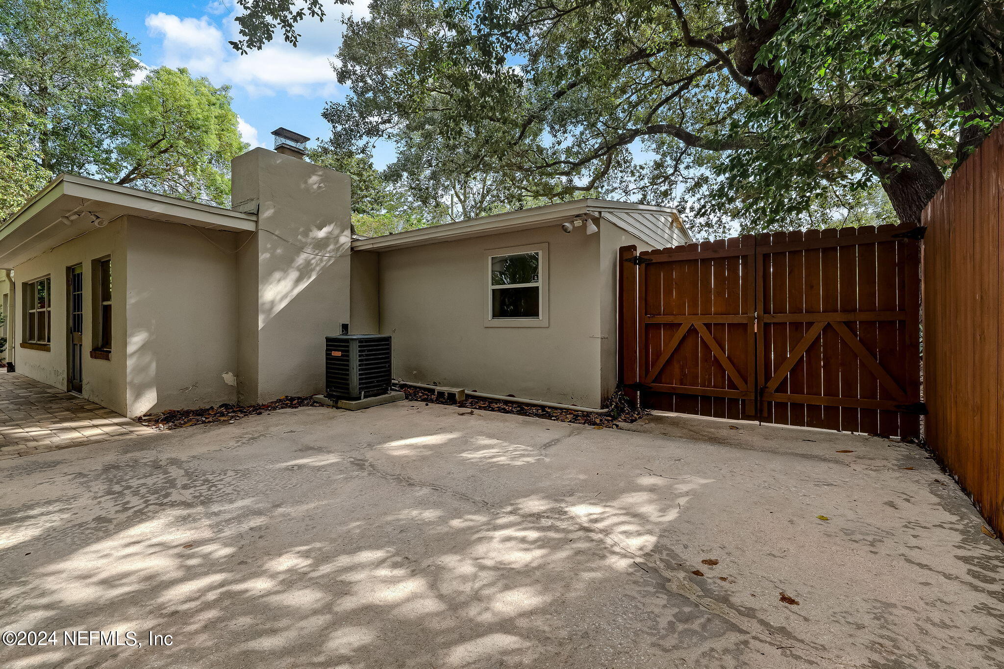 5614 Capri Road Jacksonville, FL 32244 - Photo 42 of 45 a backyard of a house with garage
