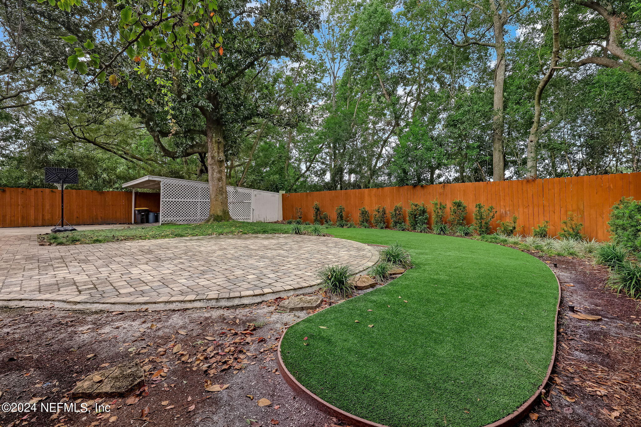 5614 Capri Road Jacksonville, FL 32244 - Photo 45 of 45 a view of a backyard with large trees