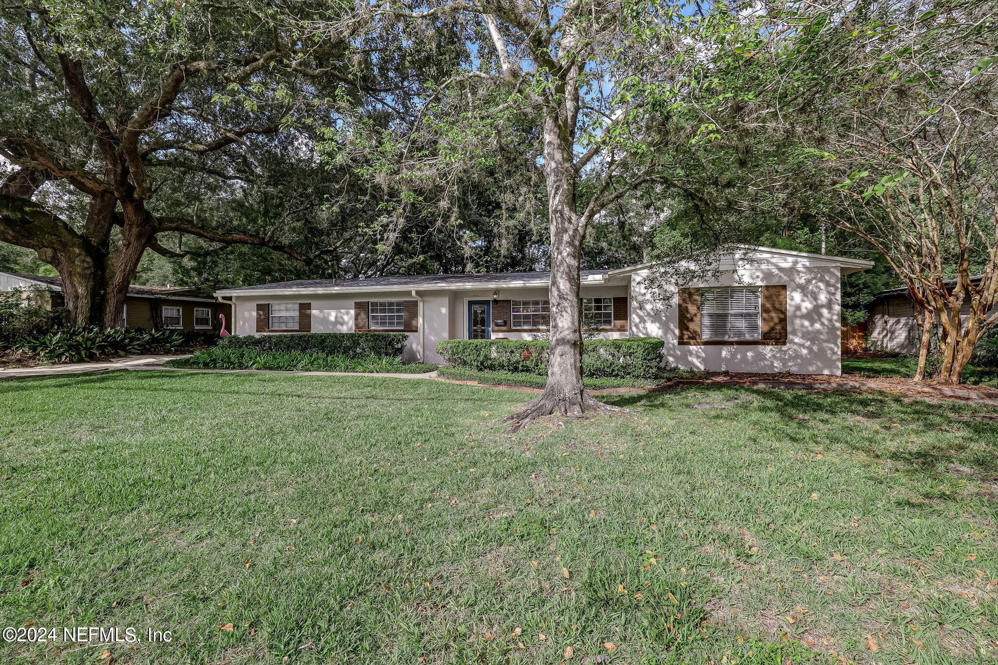 5614 Capri Road Jacksonville, FL 32244 - Photo 5 of 45 a house view with a garden space