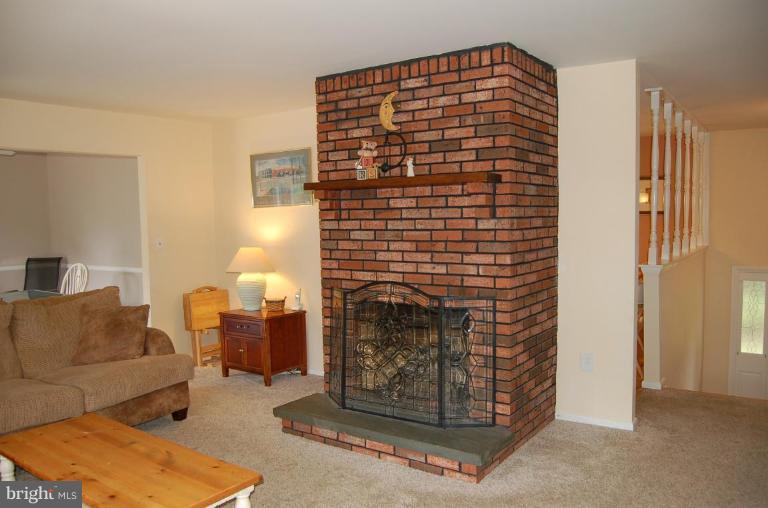 5313 Kerger Road Ellicott City, MD 21043 - Photo 14 of 24 Gas fireplace in family room.