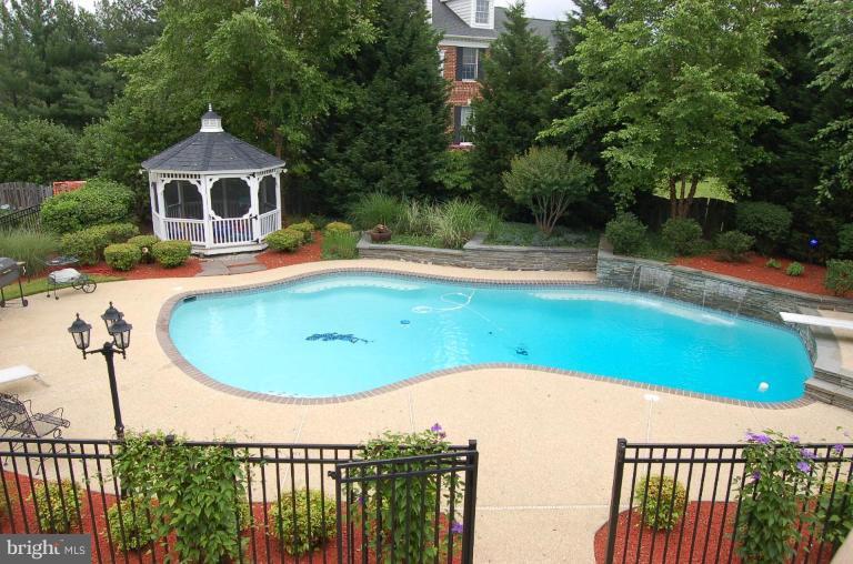 5313 Kerger Road Ellicott City, MD 21043 - Photo 3 of 24 View of pool from upper level deck.