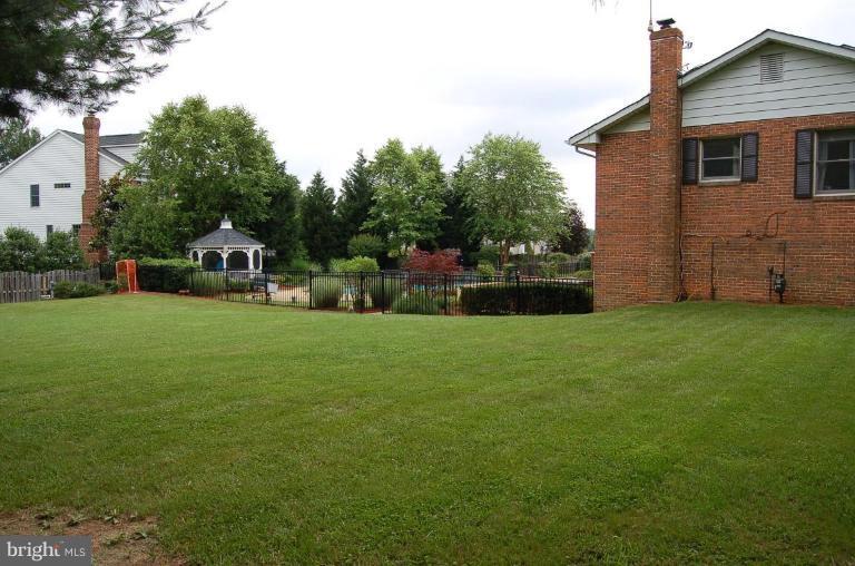 5313 Kerger Road Ellicott City, MD 21043 - Photo 22 of 24 Large, flat back & side yard.