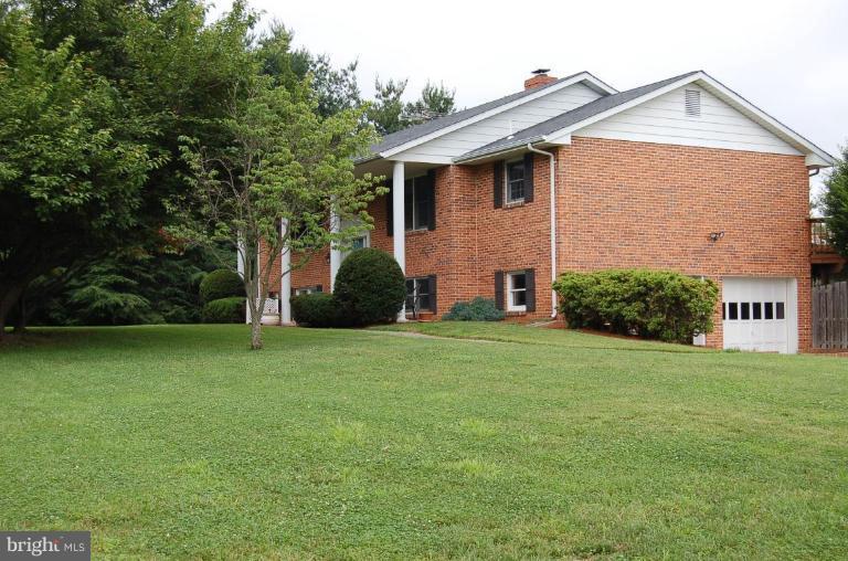 5313 Kerger Road Ellicott City, MD 21043 - Photo 24 of 24 Front yard/side view. Side loading, 2 car garage.
