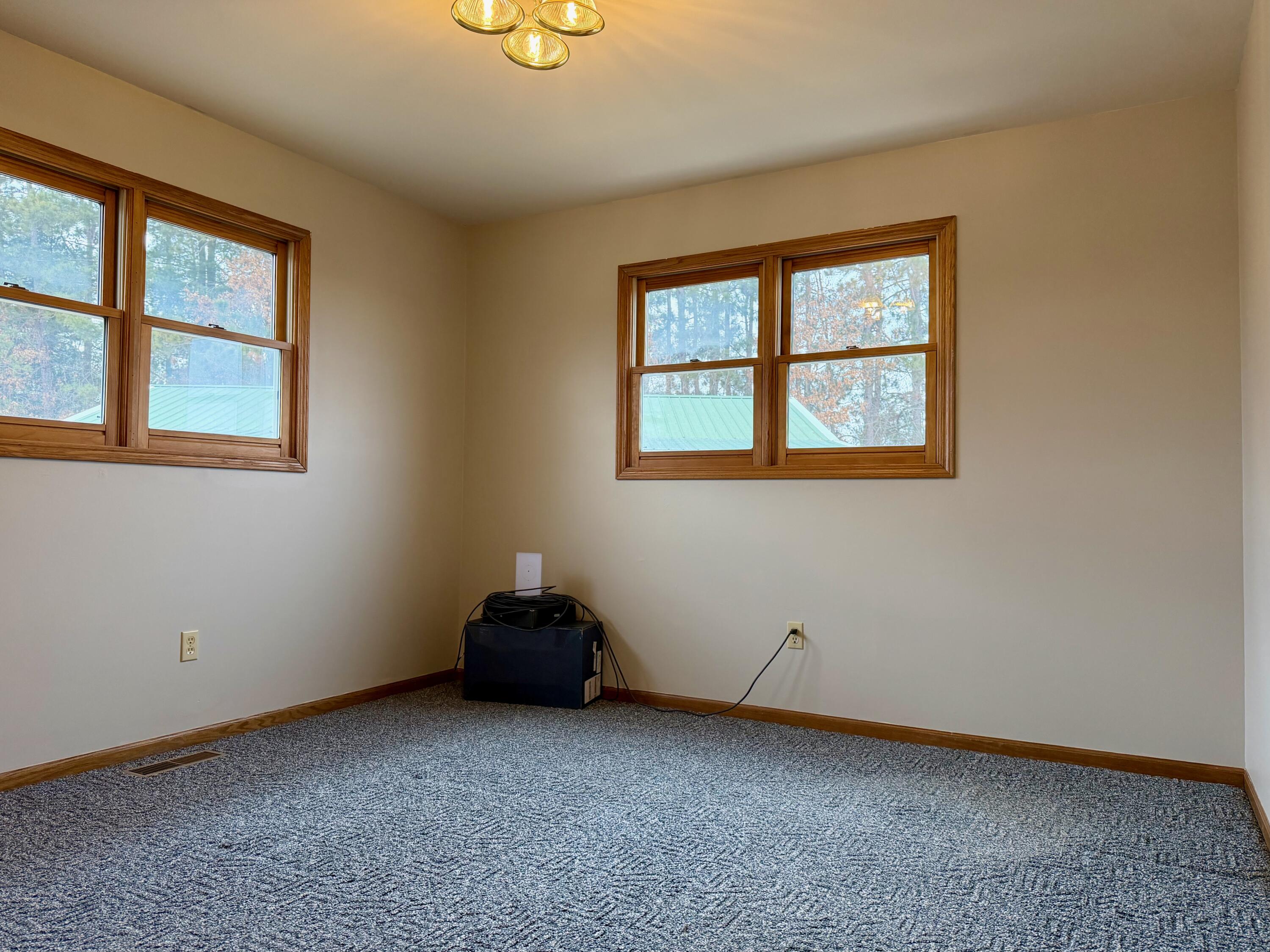 5831 West 700 North Winamac, IN 46996 - Photo 11 of 22 an empty room with a window