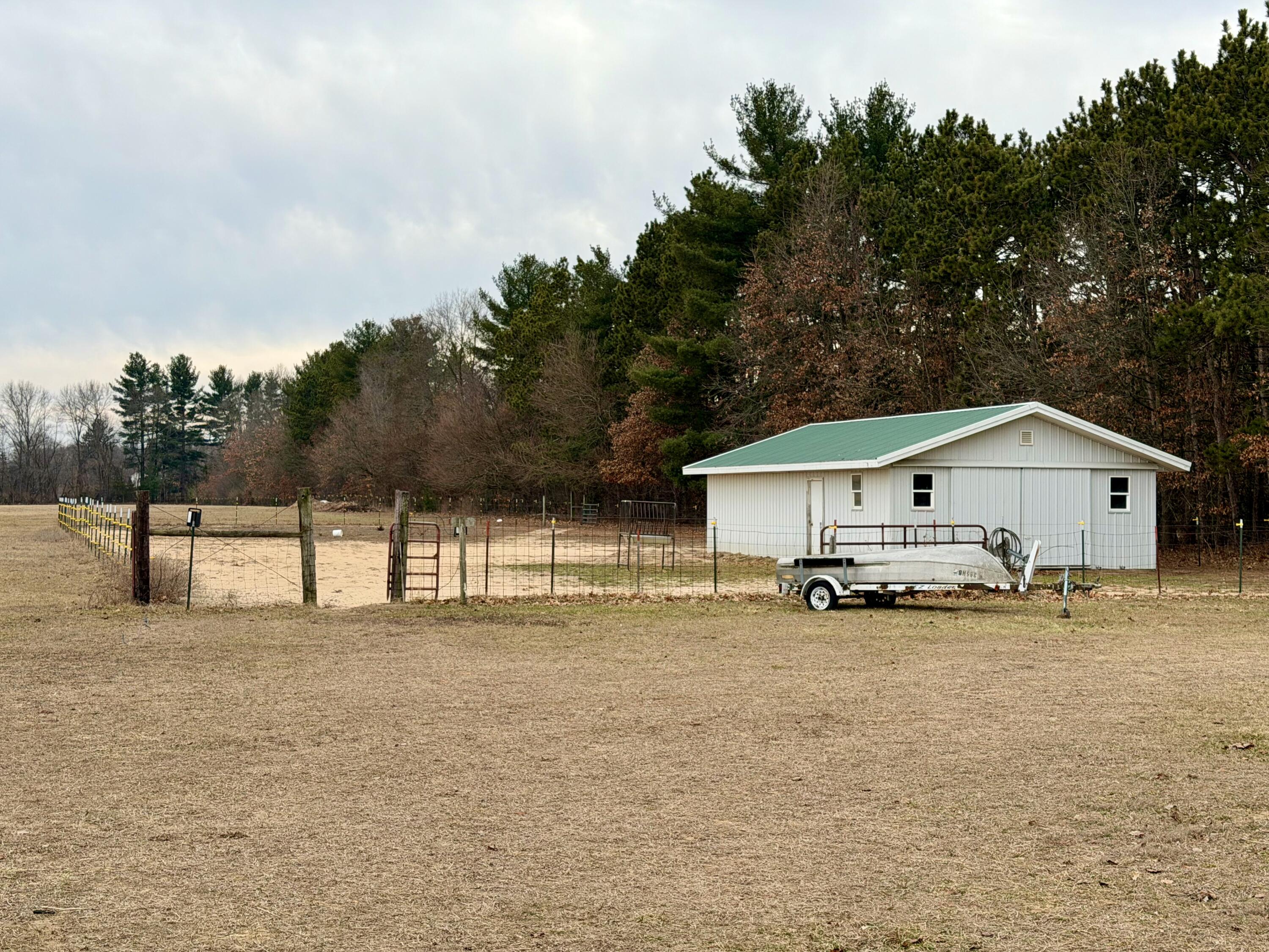 5831 West 700 North Winamac, IN 46996 - Photo 18 of 22 a view of a house with a yard