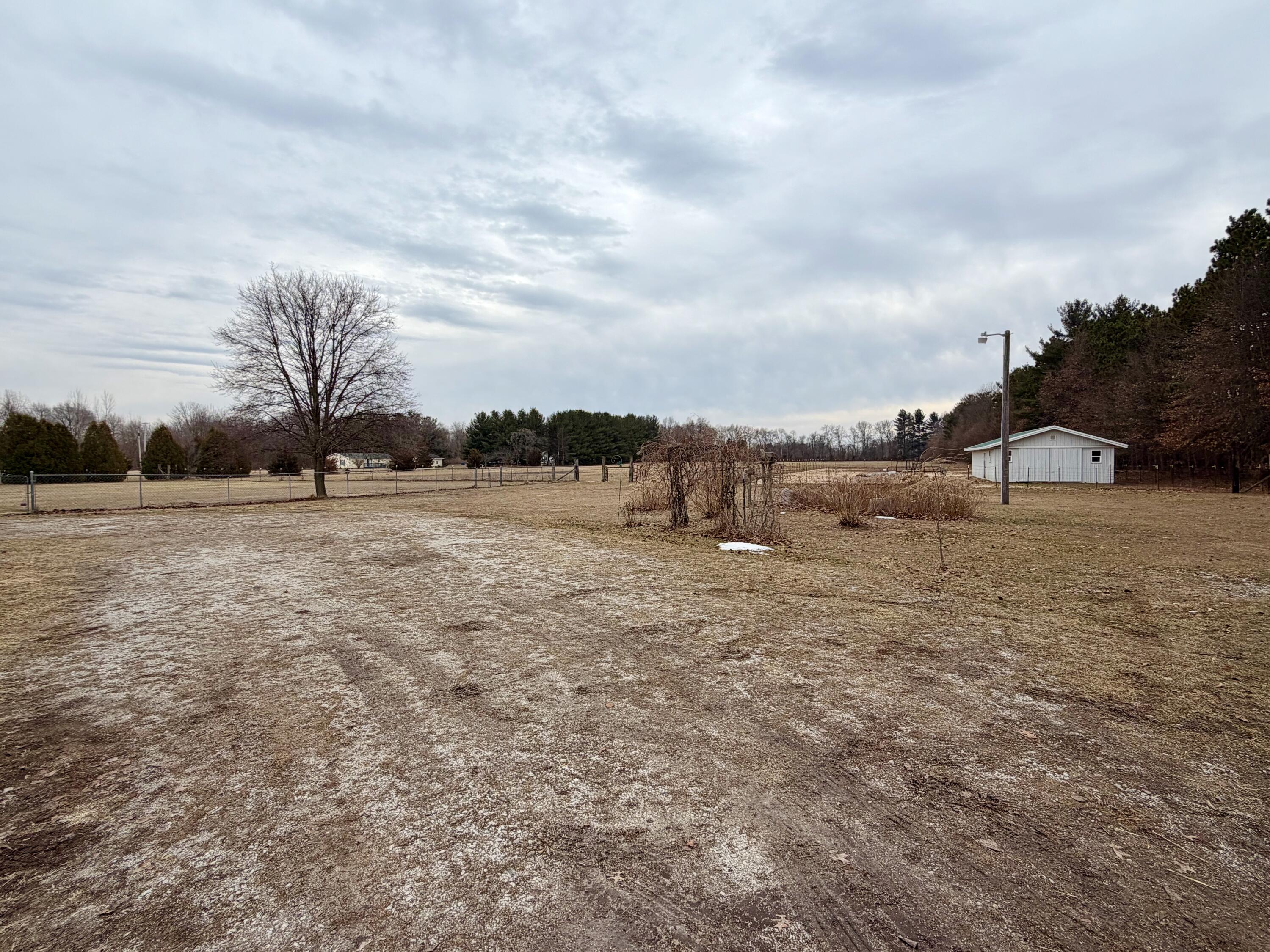 5831 West 700 North Winamac, IN 46996 - Photo 20 of 22 a view of dirt field with trees