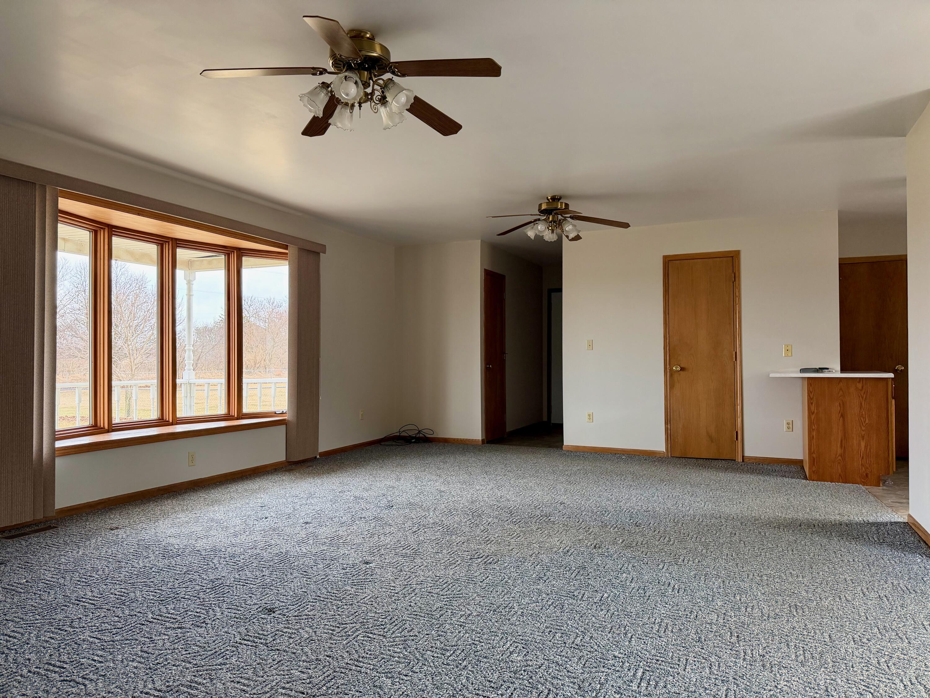 5831 West 700 North Winamac, IN 46996 - Photo 4 of 22 a view of empty room with ceiling fan