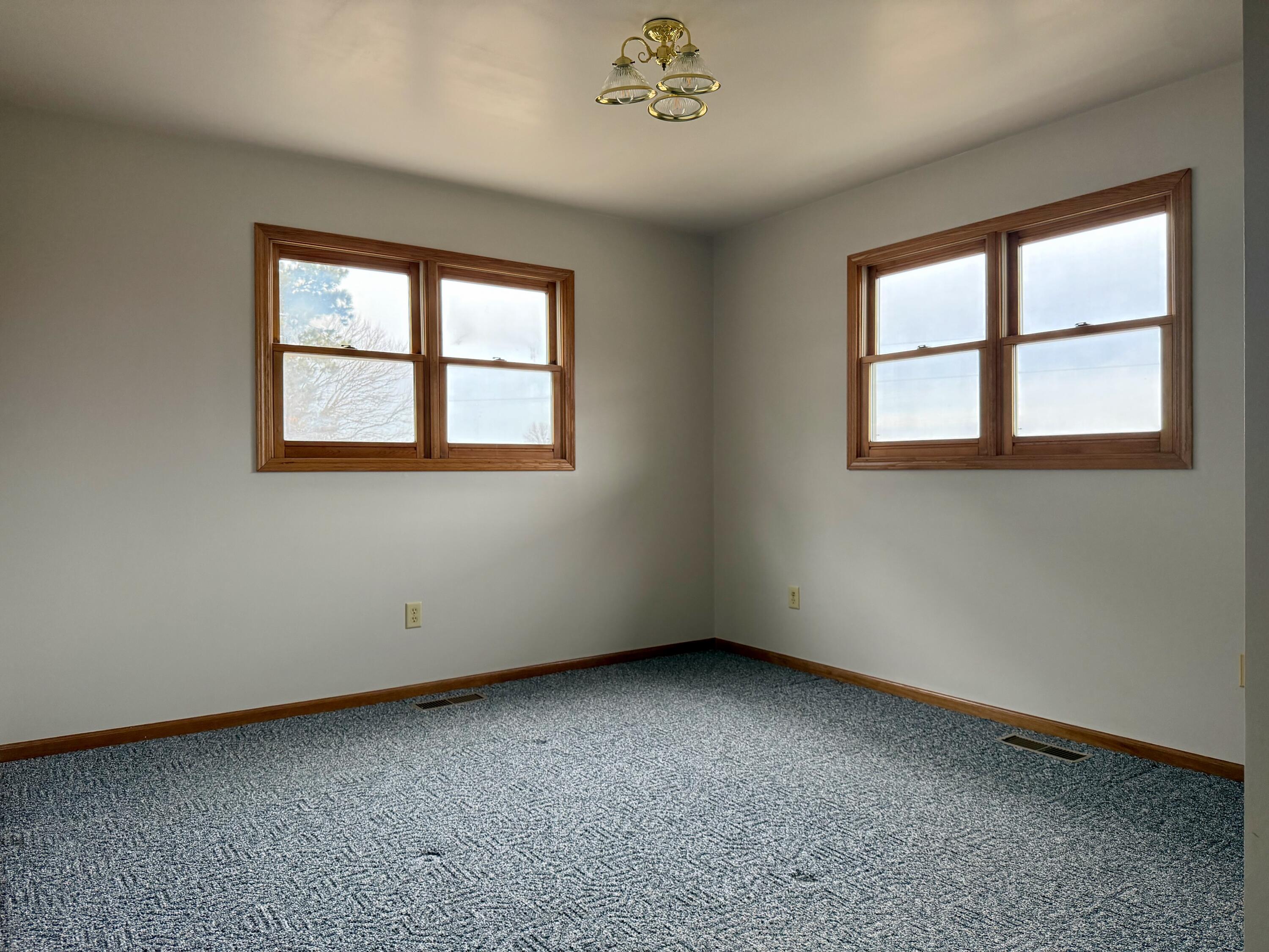 5831 West 700 North Winamac, IN 46996 - Photo 9 of 22 an empty room with a window