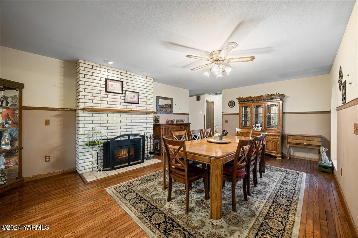 1802 Young Street Grandview, WA 98930 - Photo 17 of 31 a view of a livingroom with furniture and a fireplace
