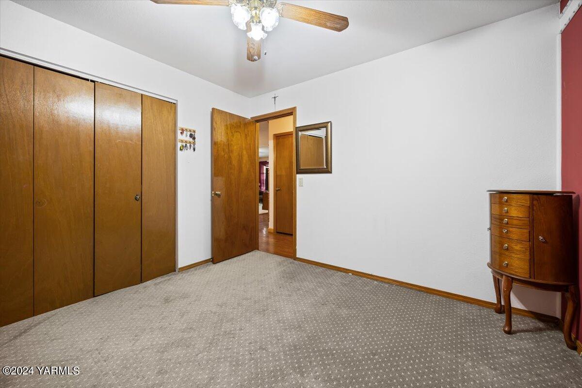 1802 Young Street Grandview, WA 98930 - Photo 24 of 31 a view of an empty room with a window