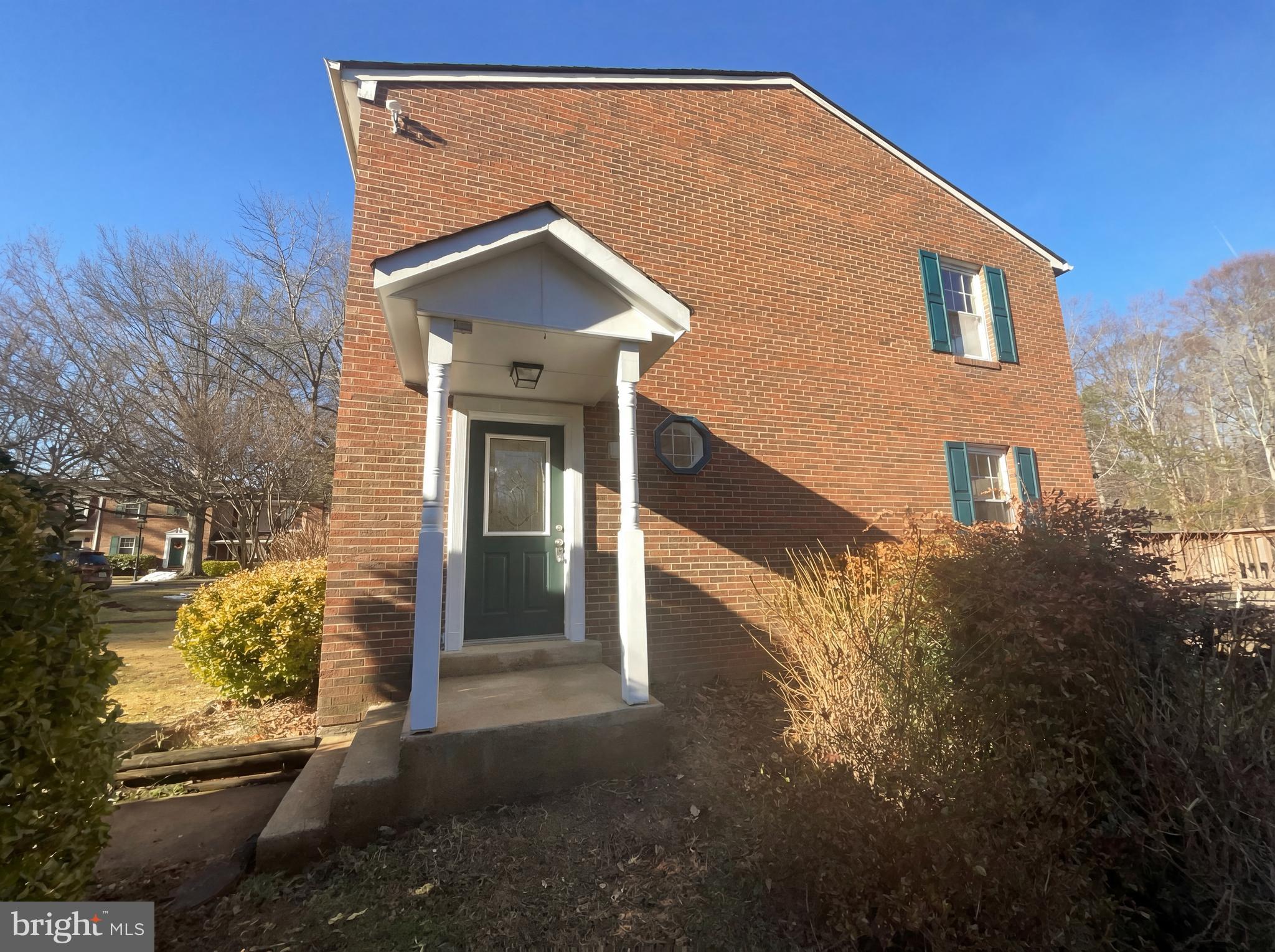 6352 Shaundale Drive Springfield, VA 22152 - Photo 2 of 50 a front view of a house with a yard