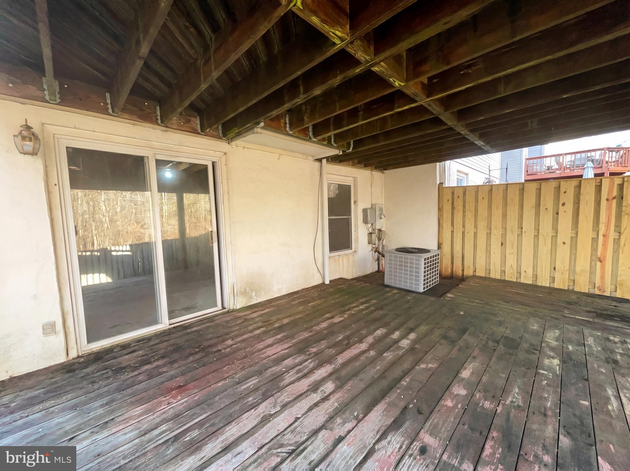 6352 Shaundale Drive Springfield, VA 22152 - Photo 31 of 50 a view of a room with wooden floor and stairs
