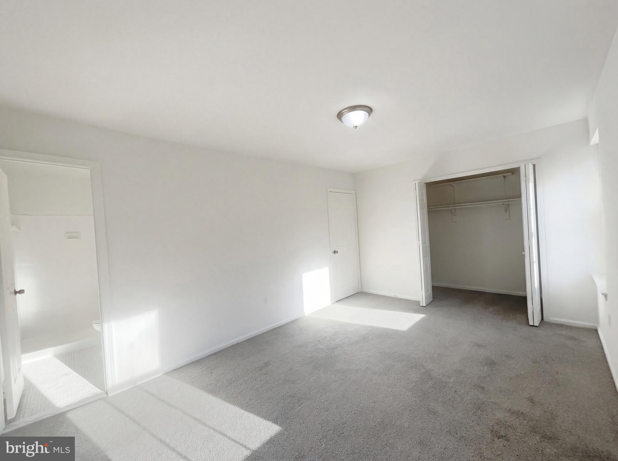 6352 Shaundale Drive Springfield, VA 22152 - Photo 45 of 50 a view of an empty room with closet and a window