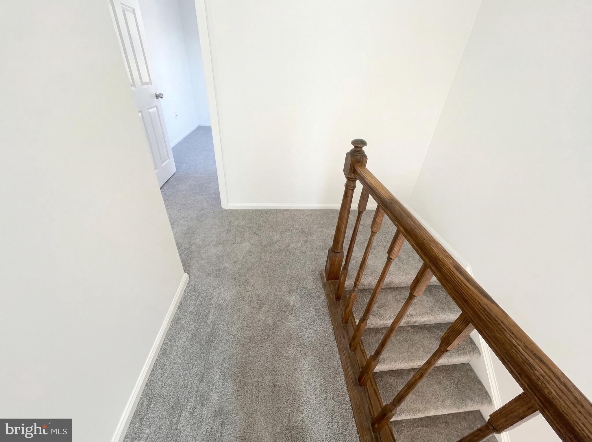6352 Shaundale Drive Springfield, VA 22152 - Photo 49 of 50 a view of staircase with white walls and a window
