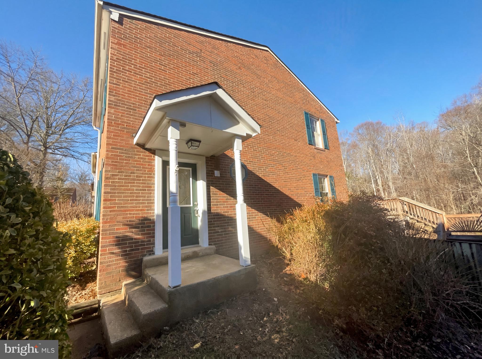 6352 Shaundale Drive Springfield, VA 22152 - Photo 10 of 50 a front view of a house with a yard