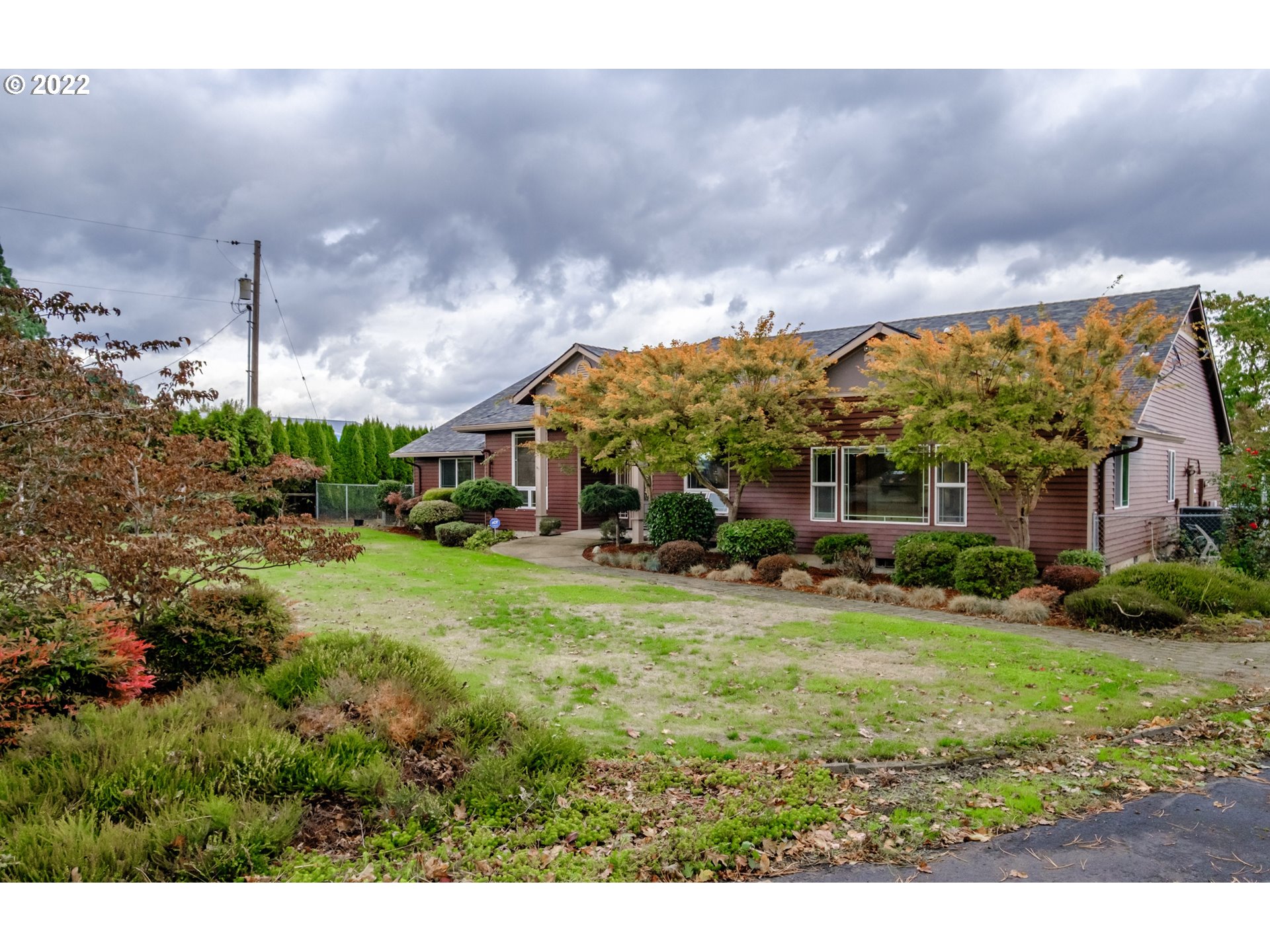 32832 South Meridian Road Woodburn, OR 97071 - Photo 2 of 32 a view of a house with a big yard plants and large trees