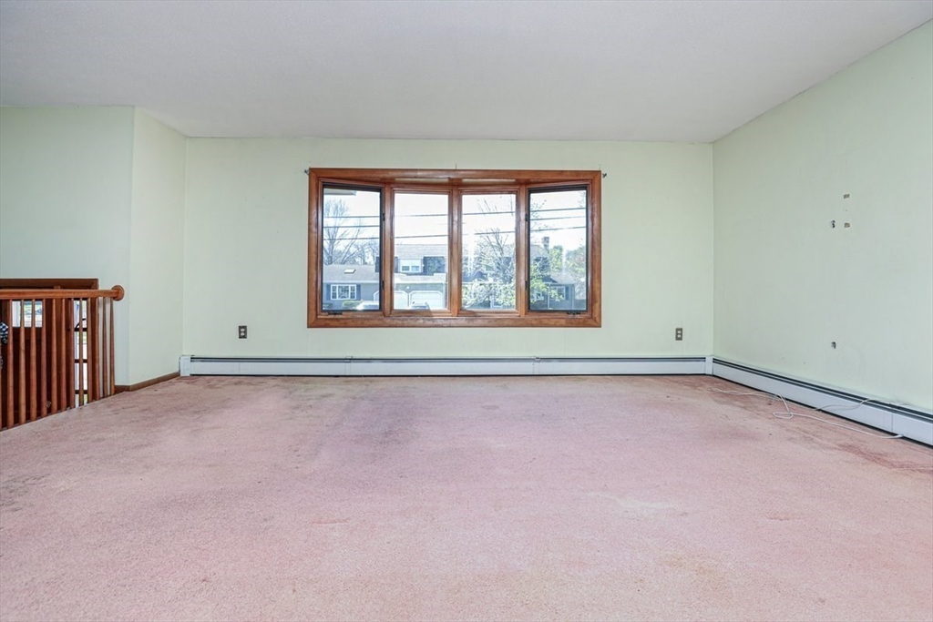 19 Longbow Road Danvers, MA 01923 - Photo 14 of 39 an empty room with windows