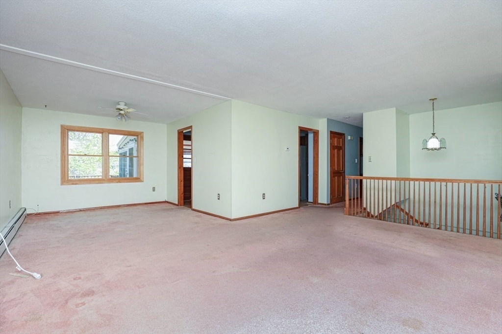 19 Longbow Road Danvers, MA 01923 - Photo 15 of 39 an empty room with windows