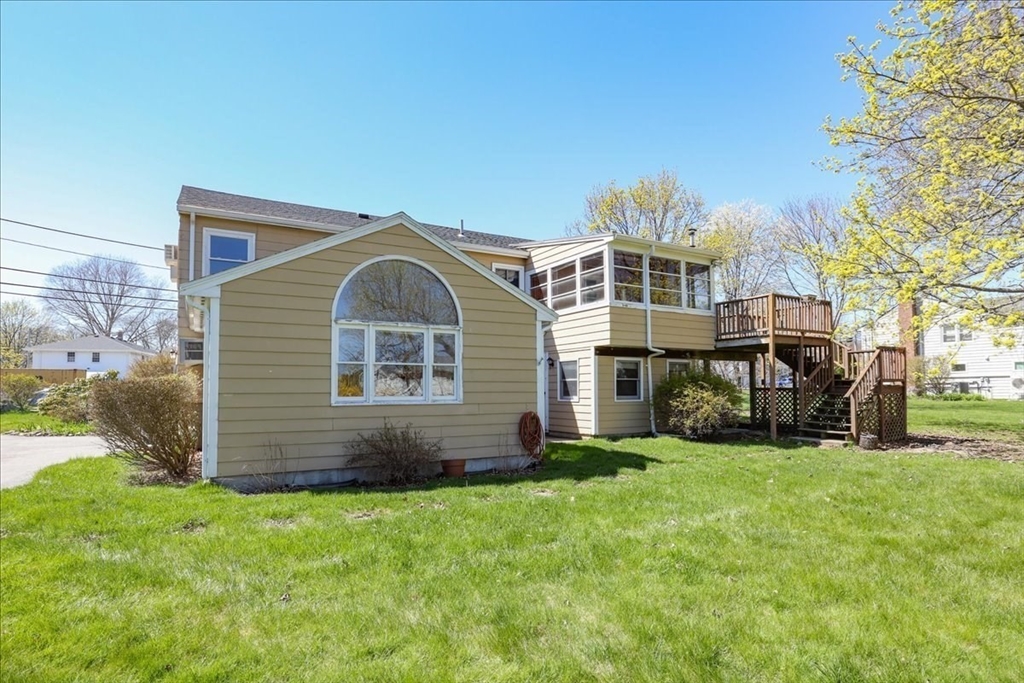 19 Longbow Road Danvers, MA 01923 - Photo 25 of 39 a front view of a house with a yard