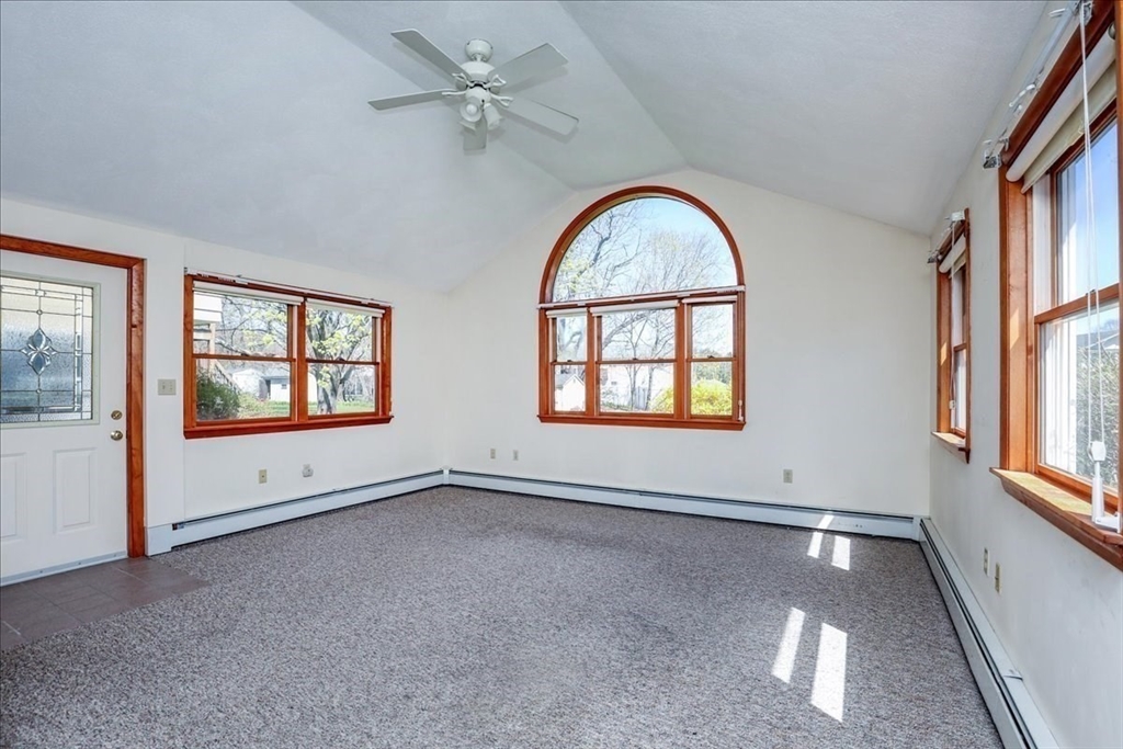 19 Longbow Road Danvers, MA 01923 - Photo 26 of 39 an empty room with windows ceiling fan and windows