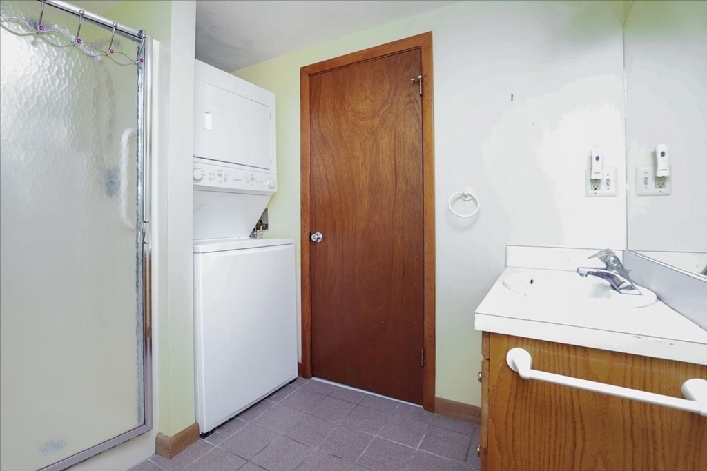 19 Longbow Road Danvers, MA 01923 - Photo 36 of 39 a bathroom with a sink and a mirror