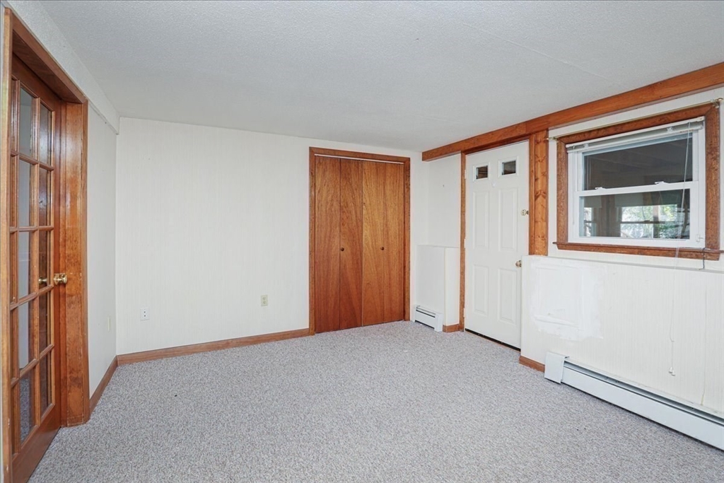 19 Longbow Road Danvers, MA 01923 - Photo 39 of 39 an empty room with windows