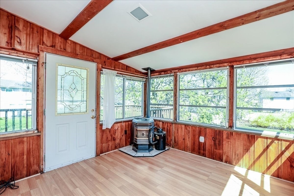 19 Longbow Road Danvers, MA 01923 - Photo 8 of 39 a bed room with a bed and a large window