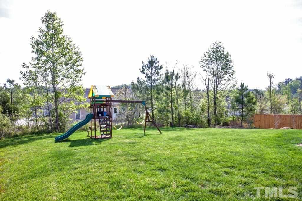 103 Orkney Road Stem, NC 27581 - Photo 24 of 25 a view of a park with swings