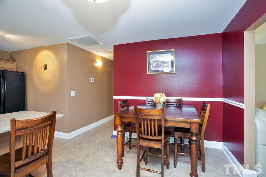 103 Orkney Road Stem, NC 27581 - Photo 9 of 25 a view of a dining room with furniture