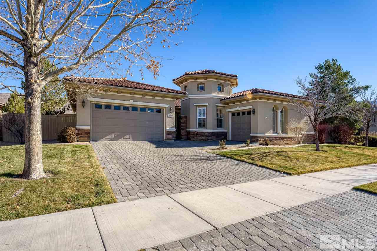10040 Burghley Lane Reno, NV 89521 - Photo 1 of 39 a front view of a house with a yard
