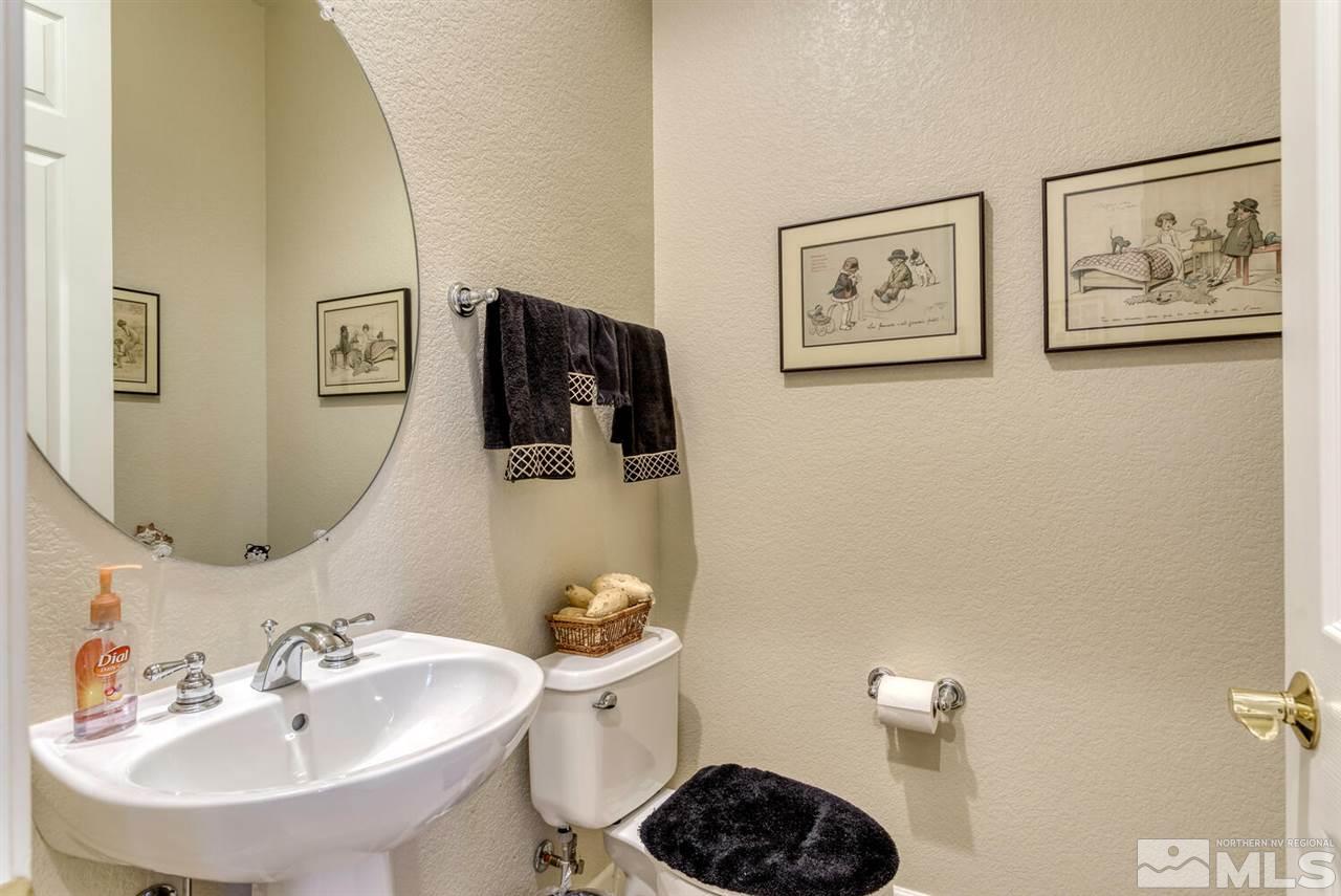 10040 Burghley Lane Reno, NV 89521 - Photo 32 of 39 a bathroom with a sink and a mirror