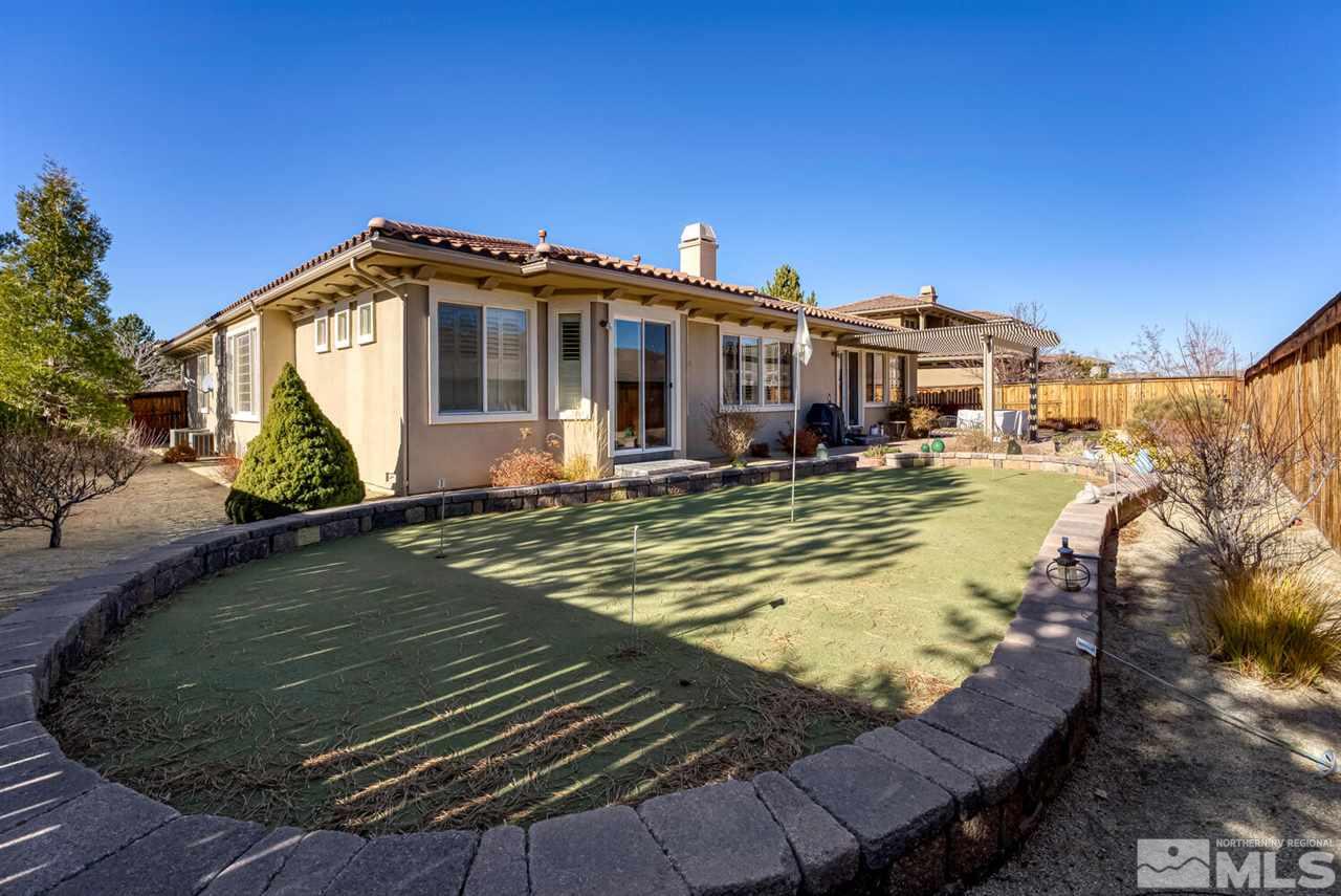 10040 Burghley Lane Reno, NV 89521 - Photo 36 of 39 a view of a house with swimming pool
