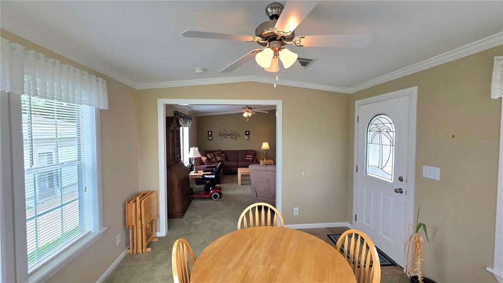 36740 Strand Drive Zephyrhills, FL 33542 - Photo 24 of 74 a view of a livingroom with furniture and windows