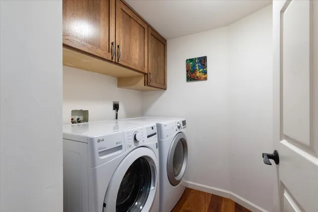 a view of hallway with washer and dryer