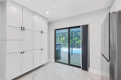 a view of entryway with white walls