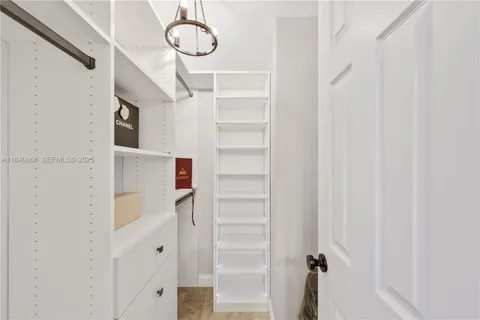 a view of a room with shelves