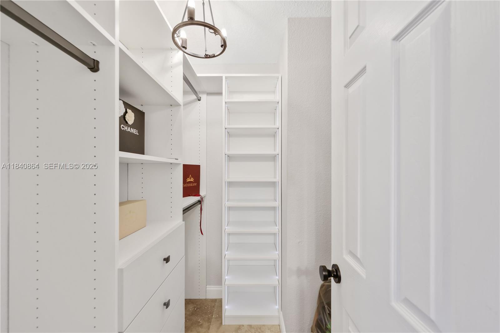 19654 Back 9 Drive Boca Raton, FL 33498 - Photo 19 of 35 a view of a room with shelves