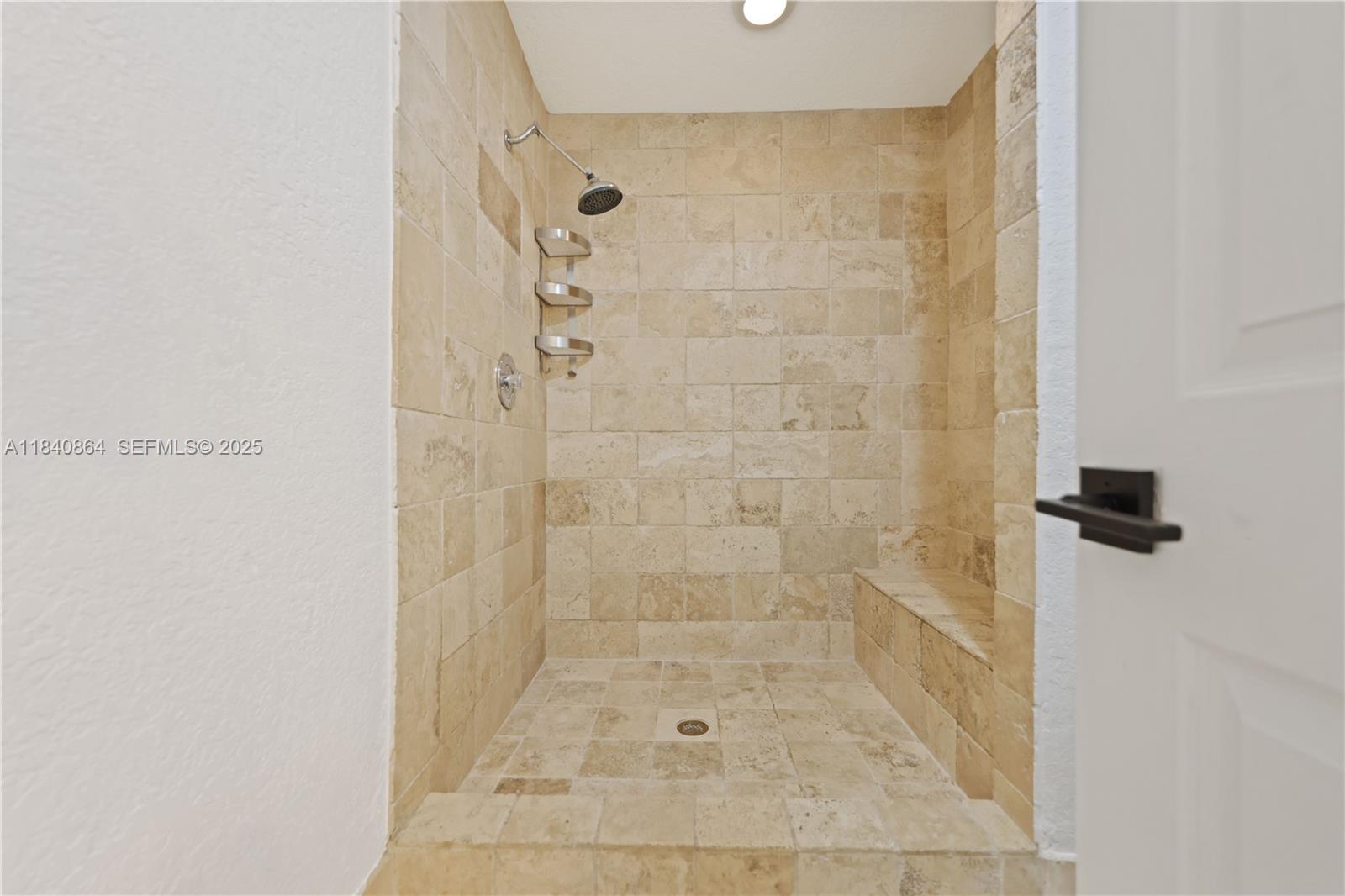 19654 Back 9 Drive Boca Raton, FL 33498 - Photo 20 of 35 a bathroom with a shower