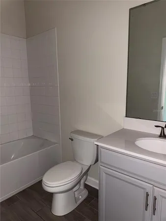 an empty room with closet area