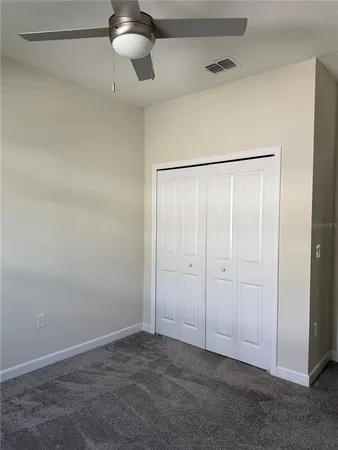 a view of an empty walk in closet