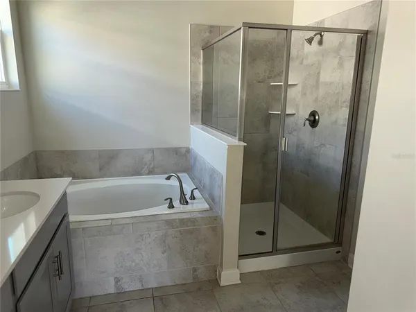 an empty room with closet area